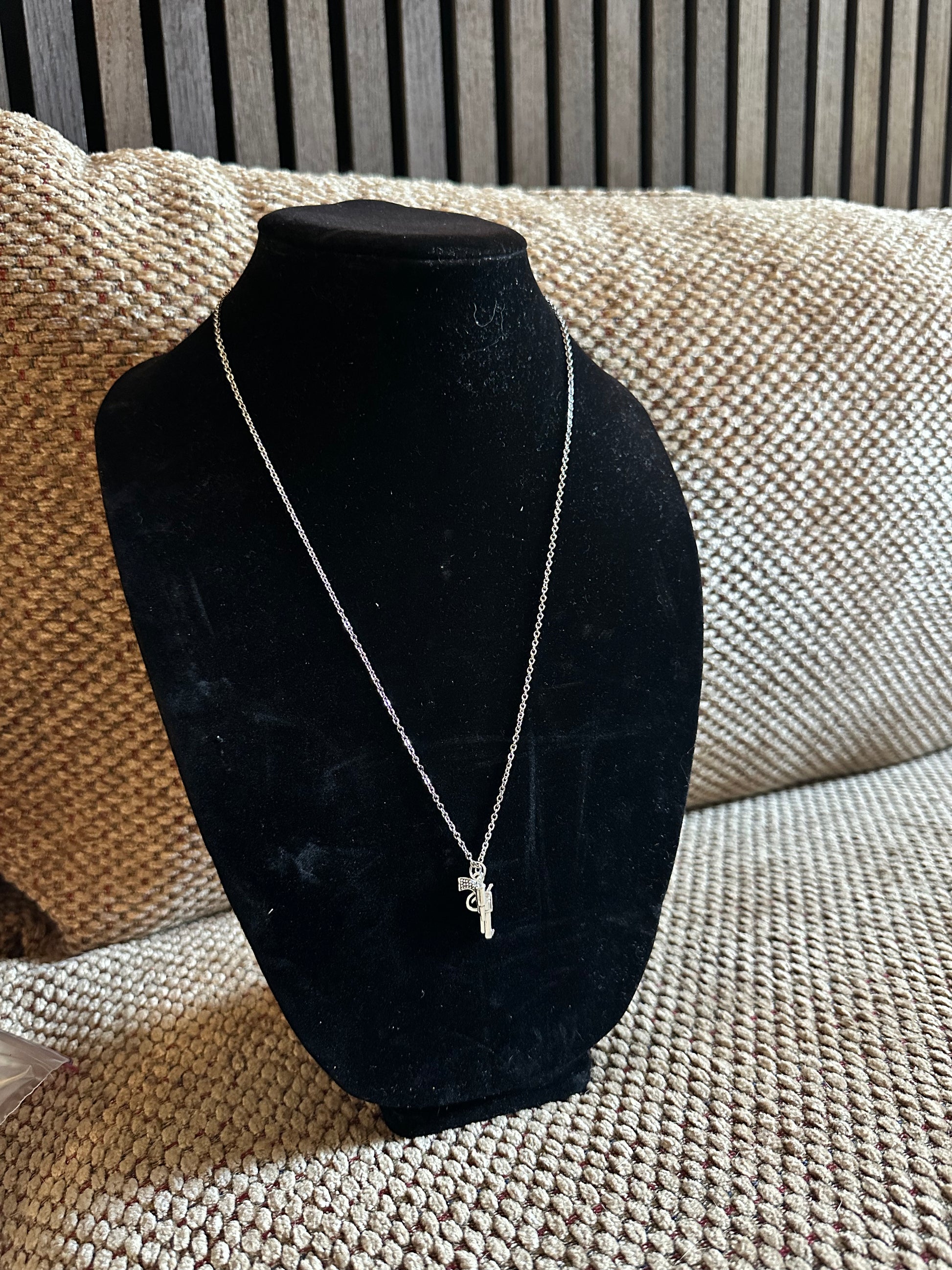 Bullet and gun necklace