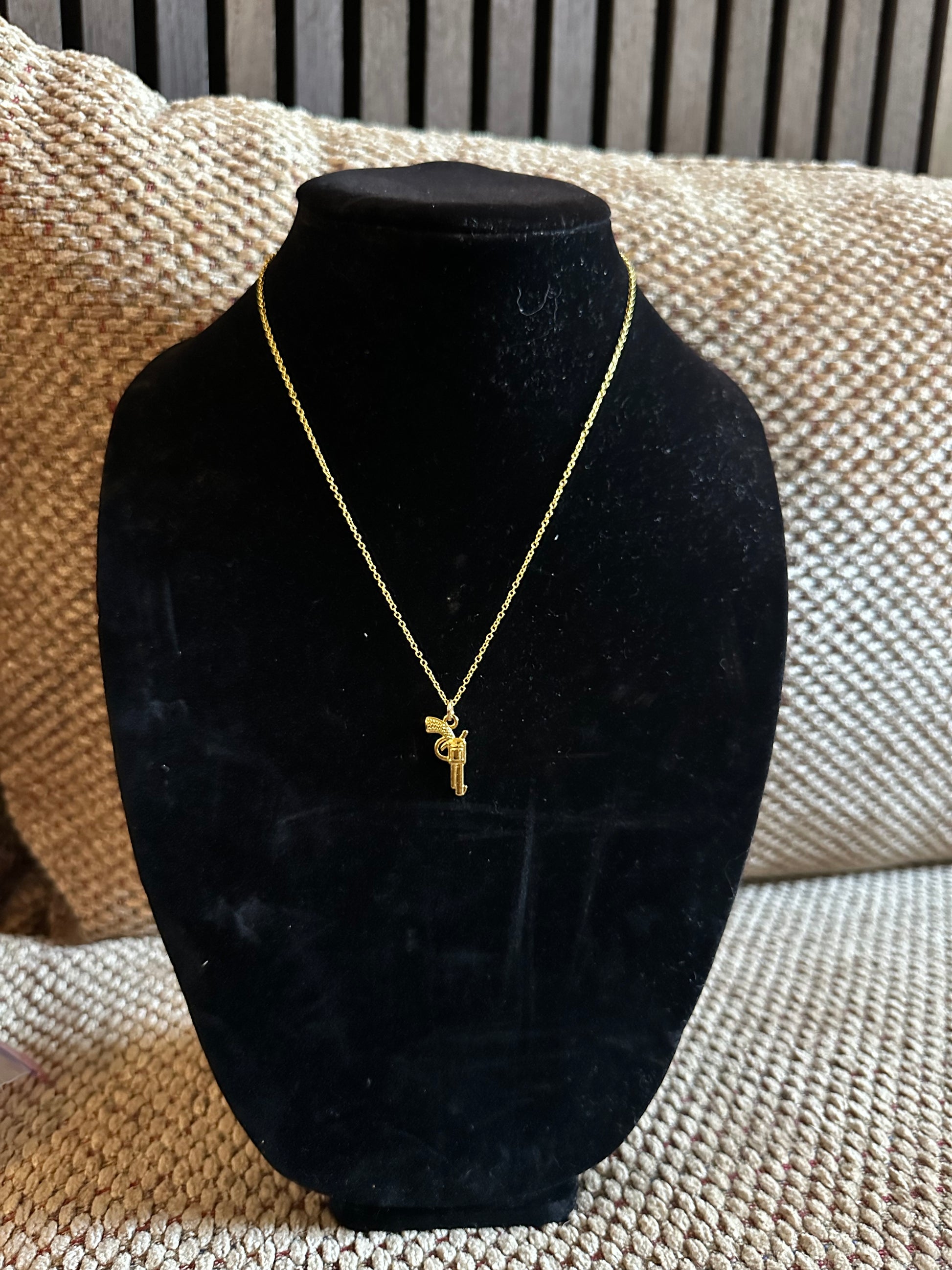 Revólver gold