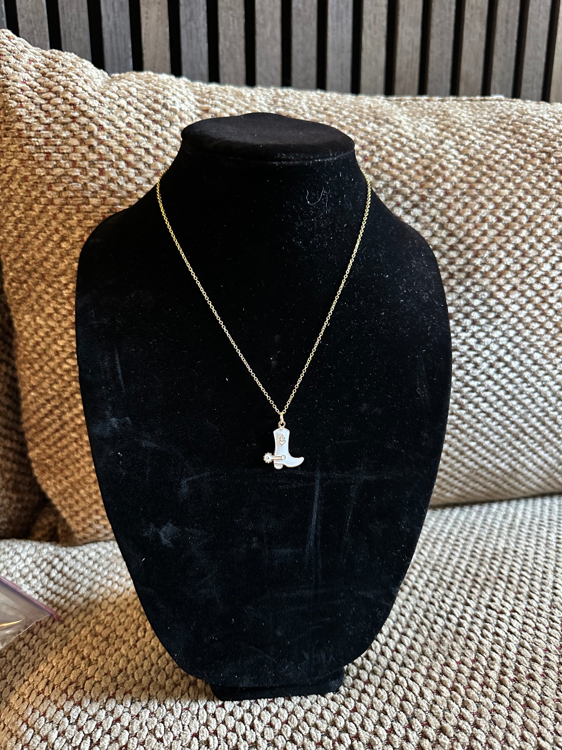 White boot necklace