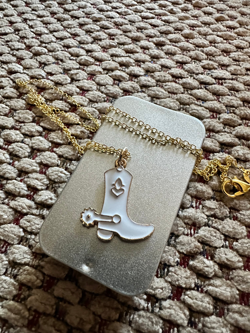 White boot necklace