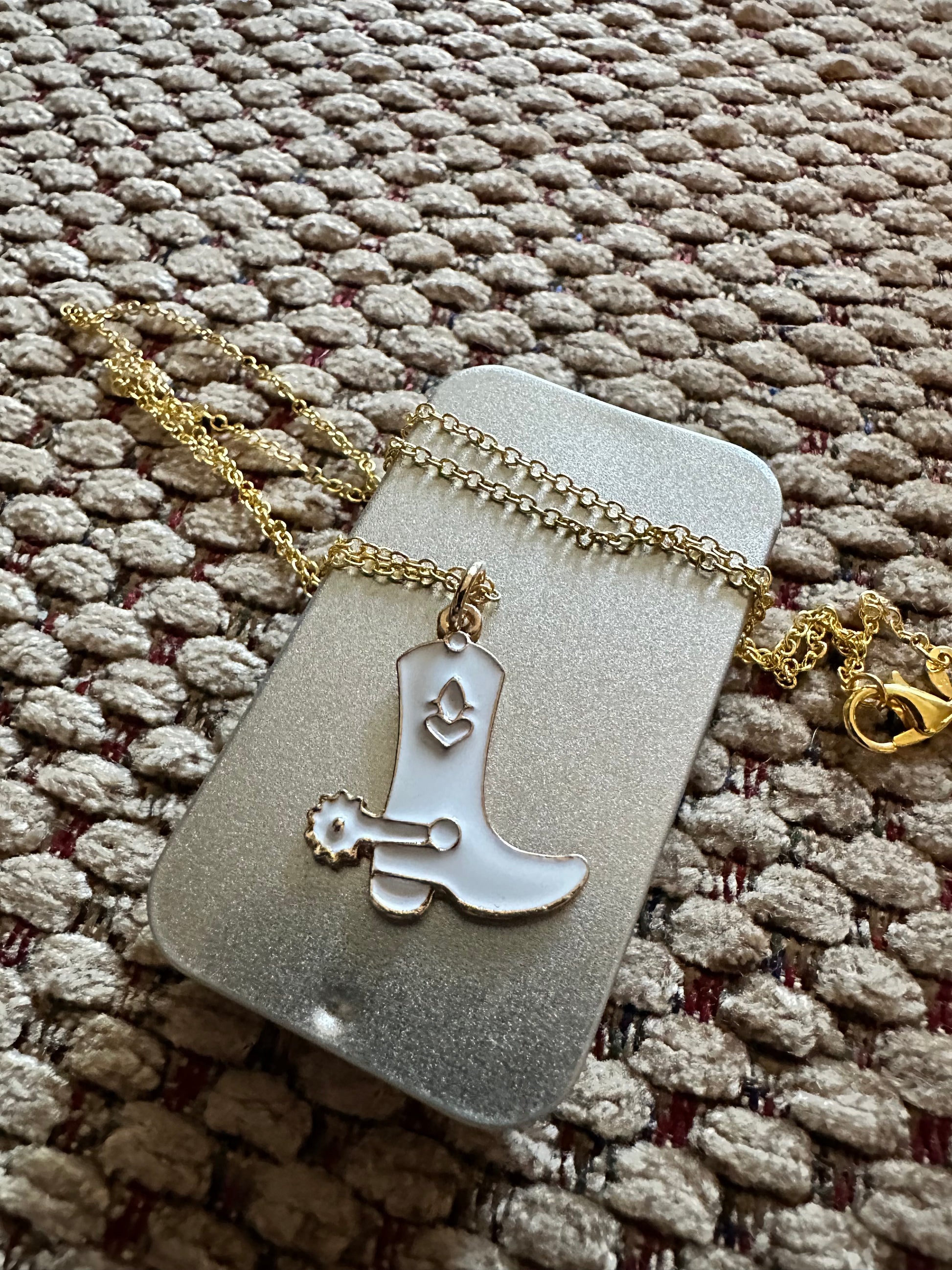 White boot necklace